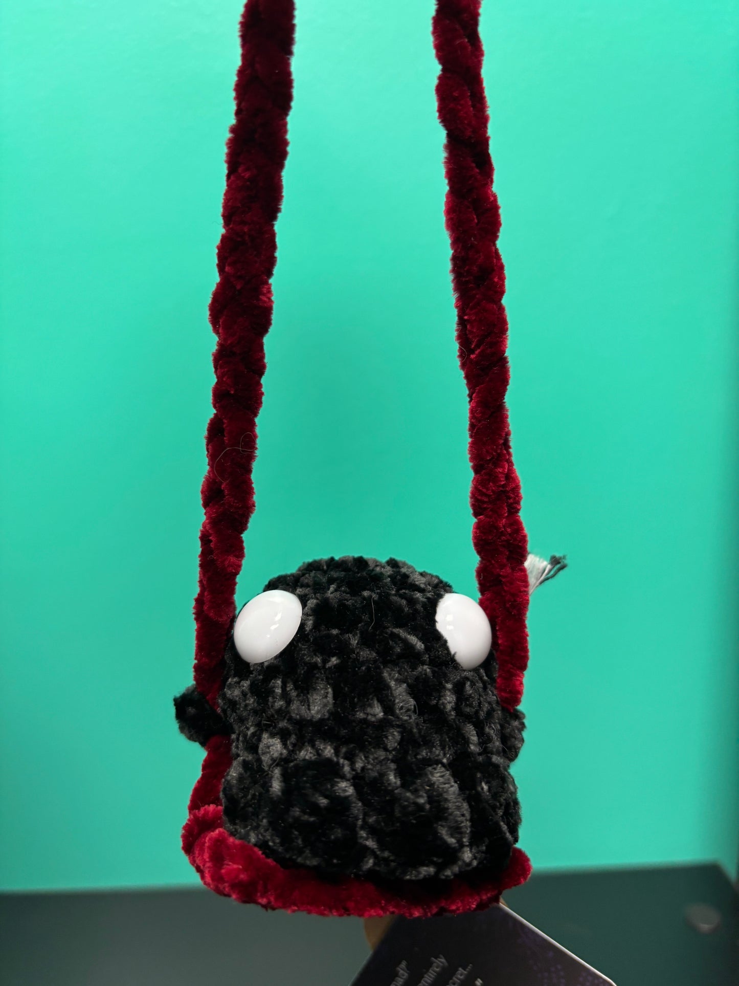 Dark Mode Swinging Ghost - crocheted creature