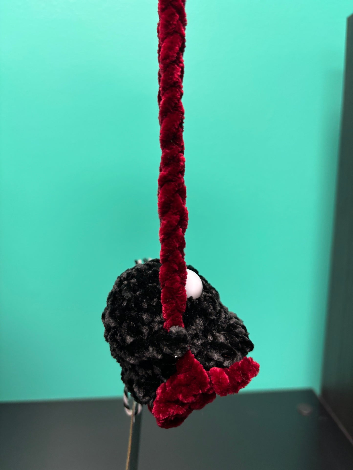 Dark Mode Swinging Ghost - crocheted creature