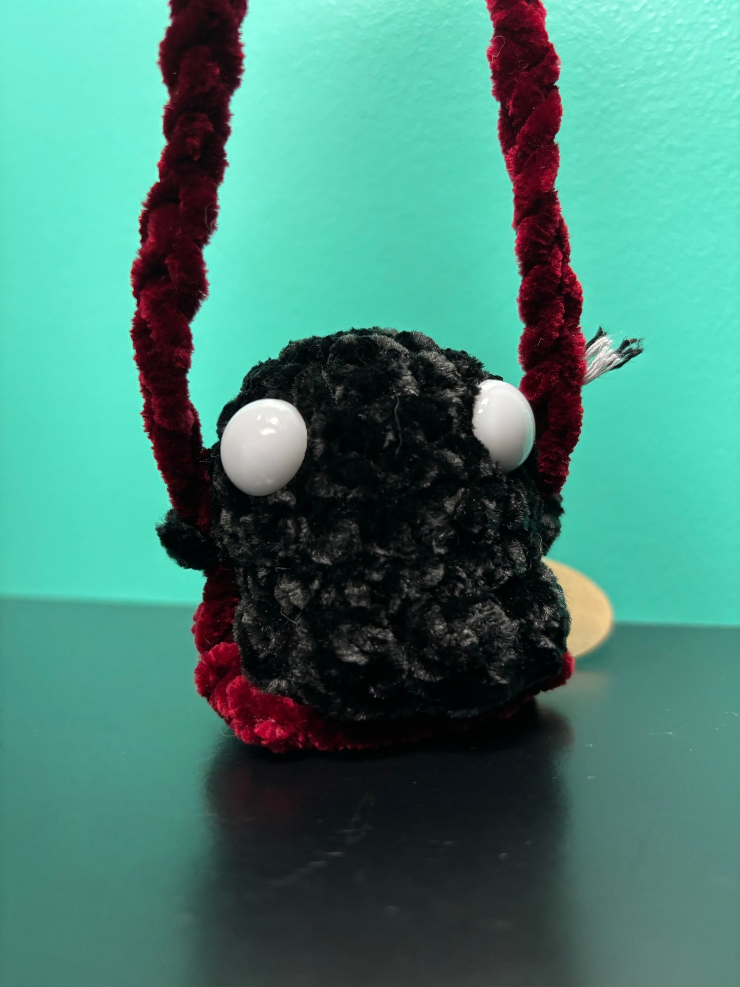 Dark Mode Swinging Ghost - crocheted creature